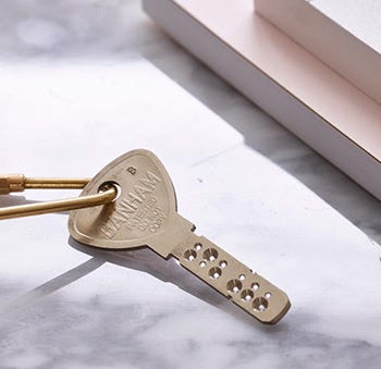 Satin Brass Door Lock on Blue Door